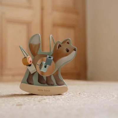 Brinquedo de madeira em forma de raposa castanha com peças móveis