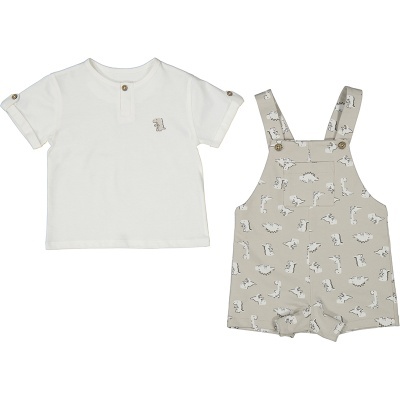 Conjunto de roupa de bebé com t-shirt branca e jardineiras bege com padrão de dinossauros