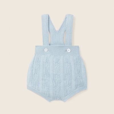Macacão de bebé em malha azul clara com botões brancos