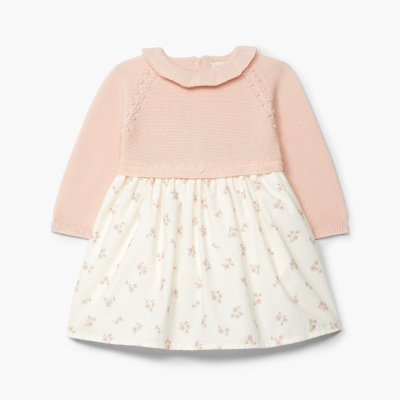 Vestido bebé malha rosa e tecido branco com flores cor-de-rosa