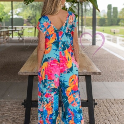 Macacão comprido colorido com padrão tropical e decote em V, visto de costas