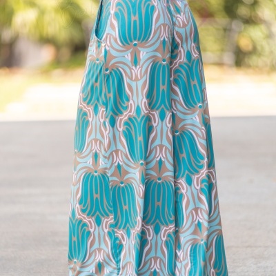 Pantalona estampada azul, bege e branco com bolso e cintura elástica