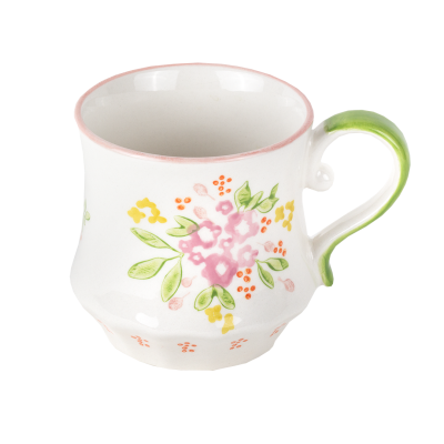 Caneca de cerâmica branca com flores pintadas e pega verde