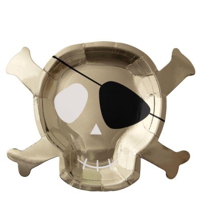 Prato dourado em formato de caveira com tapa-olho preto