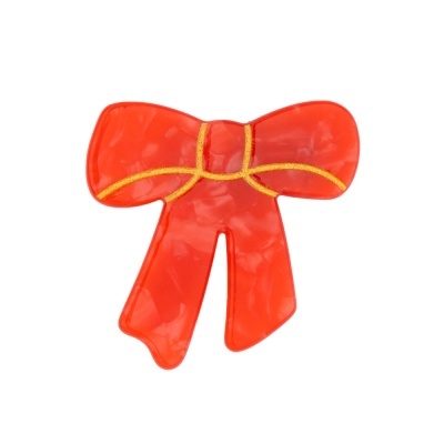 Laço vermelho decorativo com contorno dourado