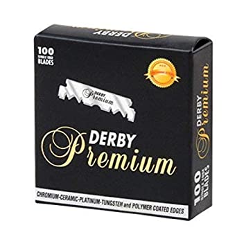 Embalagem preta de lâminas de barbear Derby Premium com texto dourado e branco