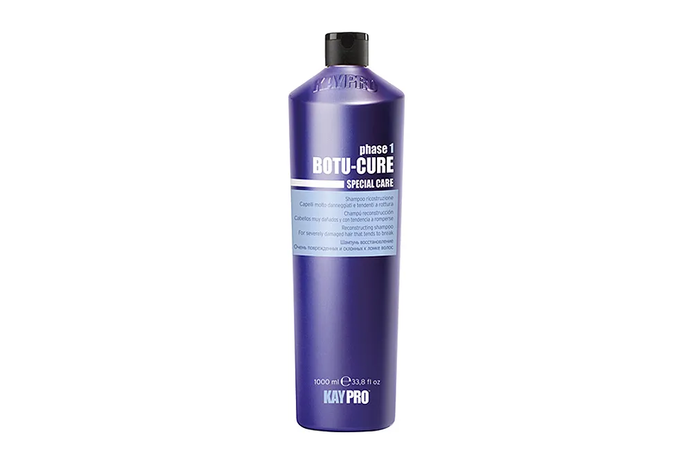 Frasco roxo cilíndrico de produto KAY PRO BOTU-CURE com tampa preta