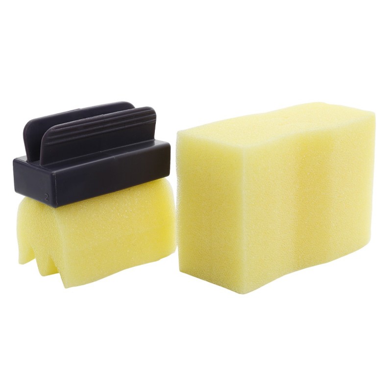 Dois esponjas amarelas, uma com suporte preto