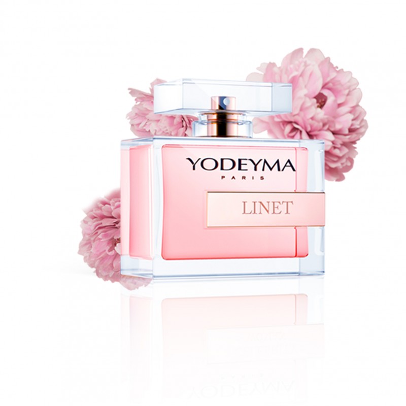 Frasco de perfume YODEYMA PARIS LINET com flores rosas ao fundo
