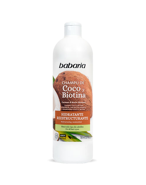 Frasco branco de champô Babaria com rótulo de coco e biotina