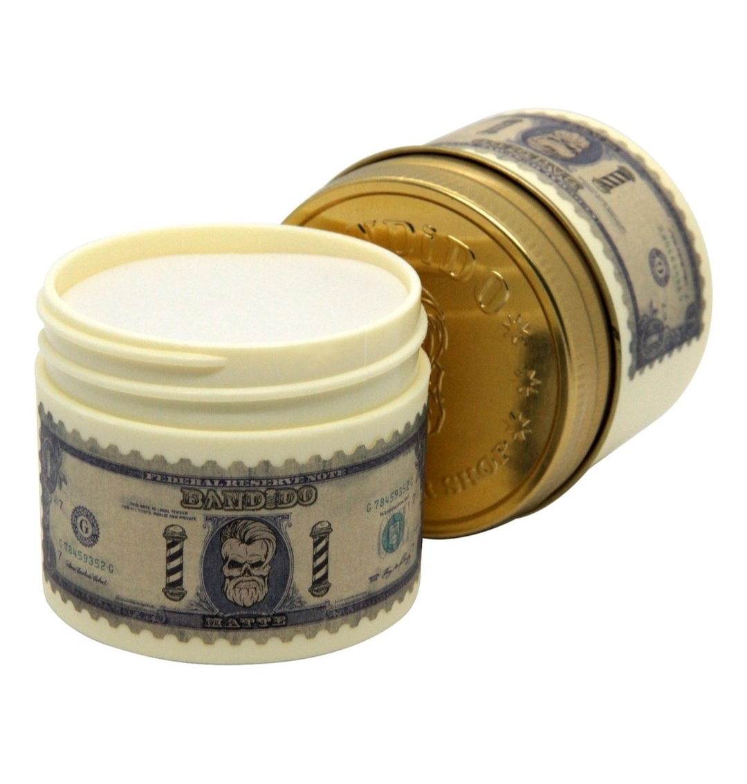 Duas embalagens de creme com rótulo tipo nota bancária e tampa dourada