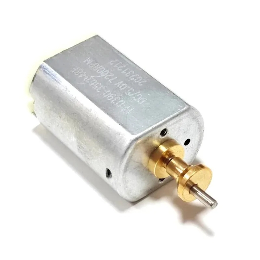 motor elétrico compacto metálico com eixo dourado e texto gravado