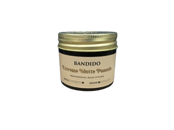 Frasco pequeno de pomada para cabelo com tampa dourada e rótulo bege da marca BANDIDO