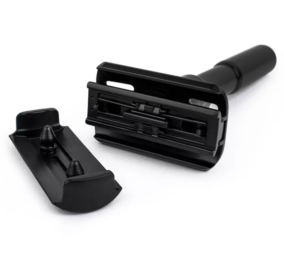 aparelho de barbear clássico preto desmontado