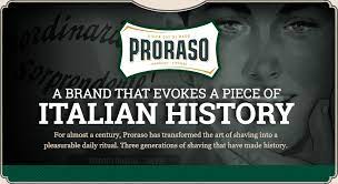 Cartaz promocional verde e preto com texto em inglês sobre a marca Proraso e rosto desfocado ao fundo