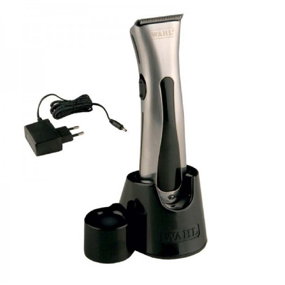 Aparelho de corte de cabelo elétrico WAHL com base carregadora e adaptador.