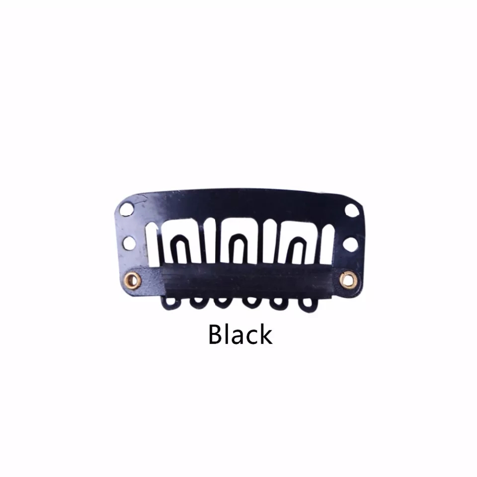 Prendedor de cabelo preto de metal com dentes e duas ilhós douradas