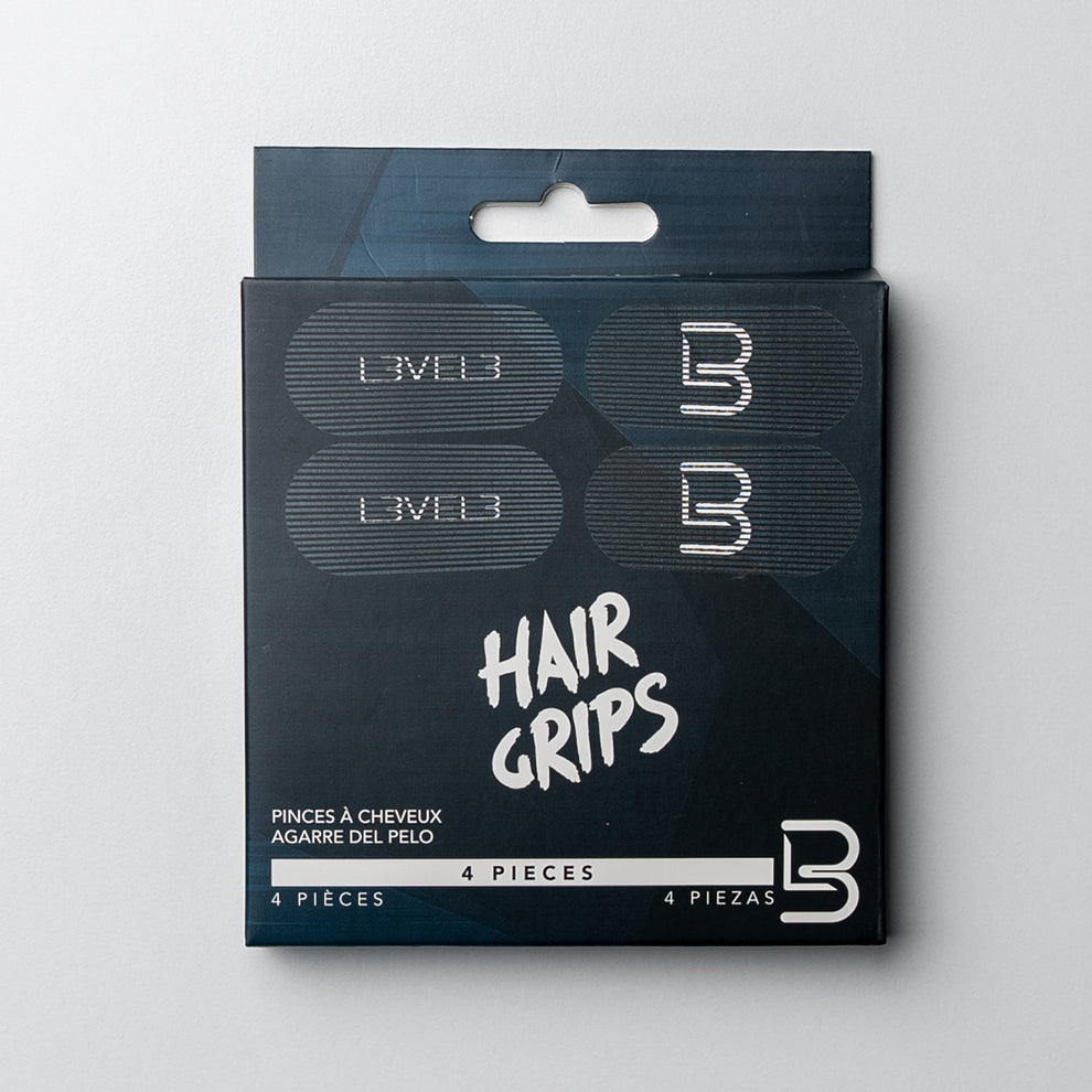 Embalaem preta com quatro Hair Grips metálicos prateados com texto LIVED
