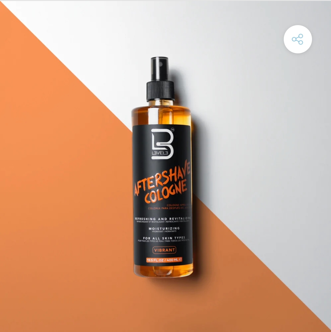 Frasco de colónia pós-barba laranja com rótulo preto e branco