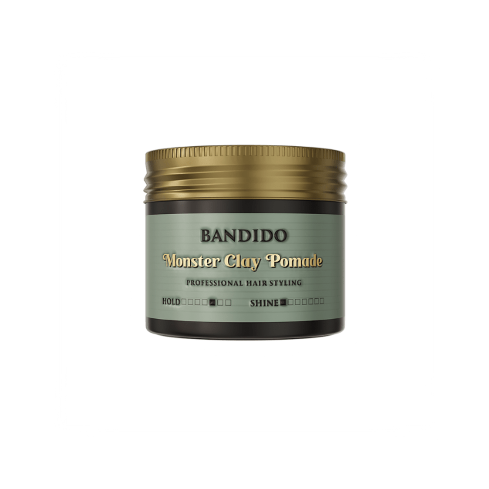 Pomada para cabelo Monster Clay Pomade com tampa dourada e rótulo verde claro