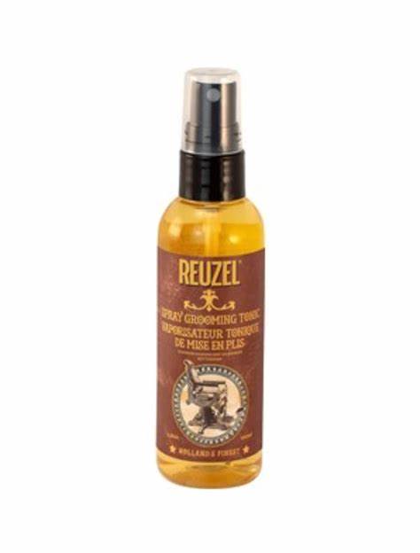 Frasco de spray Reuzel grooming tonic com rótulo castanho e texto dourado