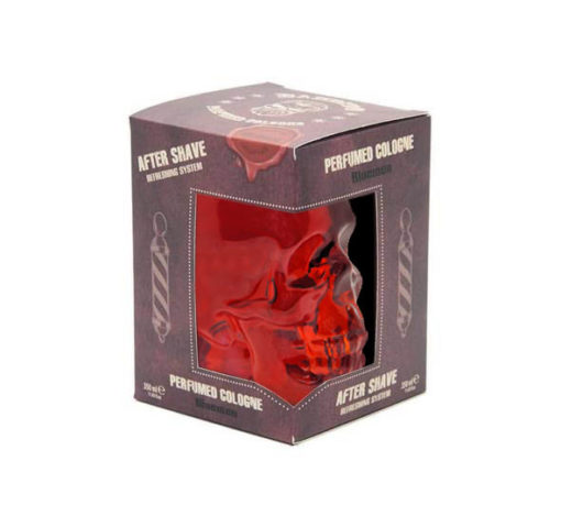 Colónia perfumada em frasco de caveira vermelha dentro de caixa roxa