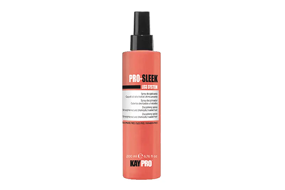 Frasco cor de coral com pulverizador preto do produto capilar PRO-SLEEK LISS SYSTEM da KAY PRO