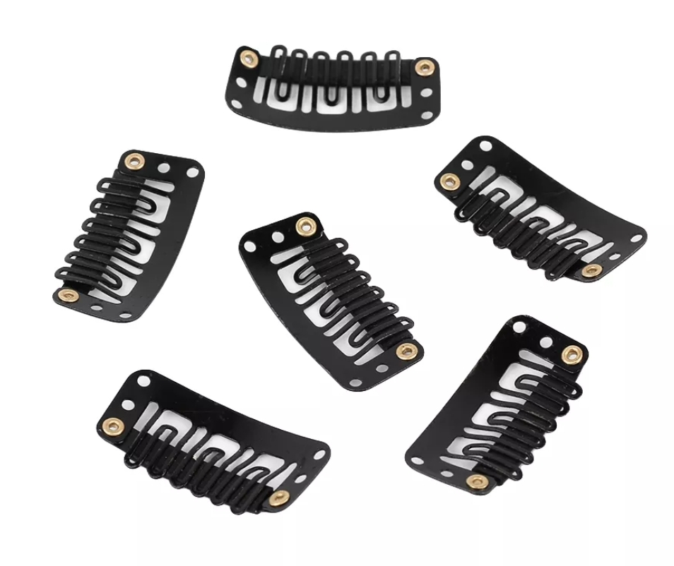 Seis presilhas de cabelo pretas de metal com molas e ilhós dourados