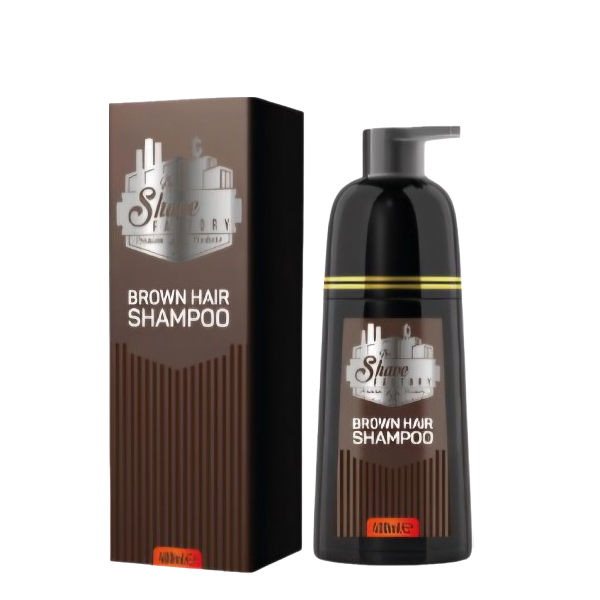 Champô para cabelo castanho em frasco preto com tampa de bomba e embalagem castanha da Shave Factory.