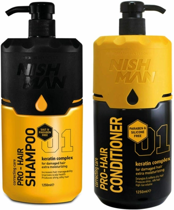 Duas embalagens NISH MAN PRO-HAIR shampoo e condicionador, cores preto e amarelo, com dispensadores.