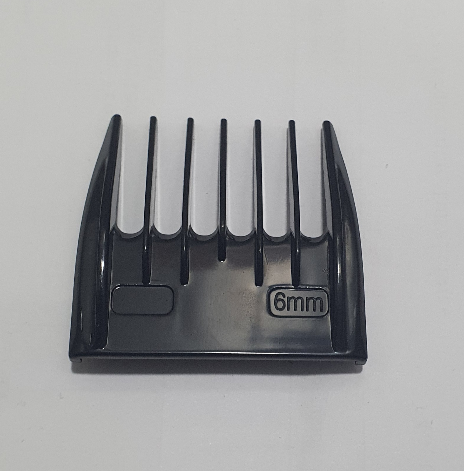 Peça preta para máquina de cortar cabelo com texto 6mm