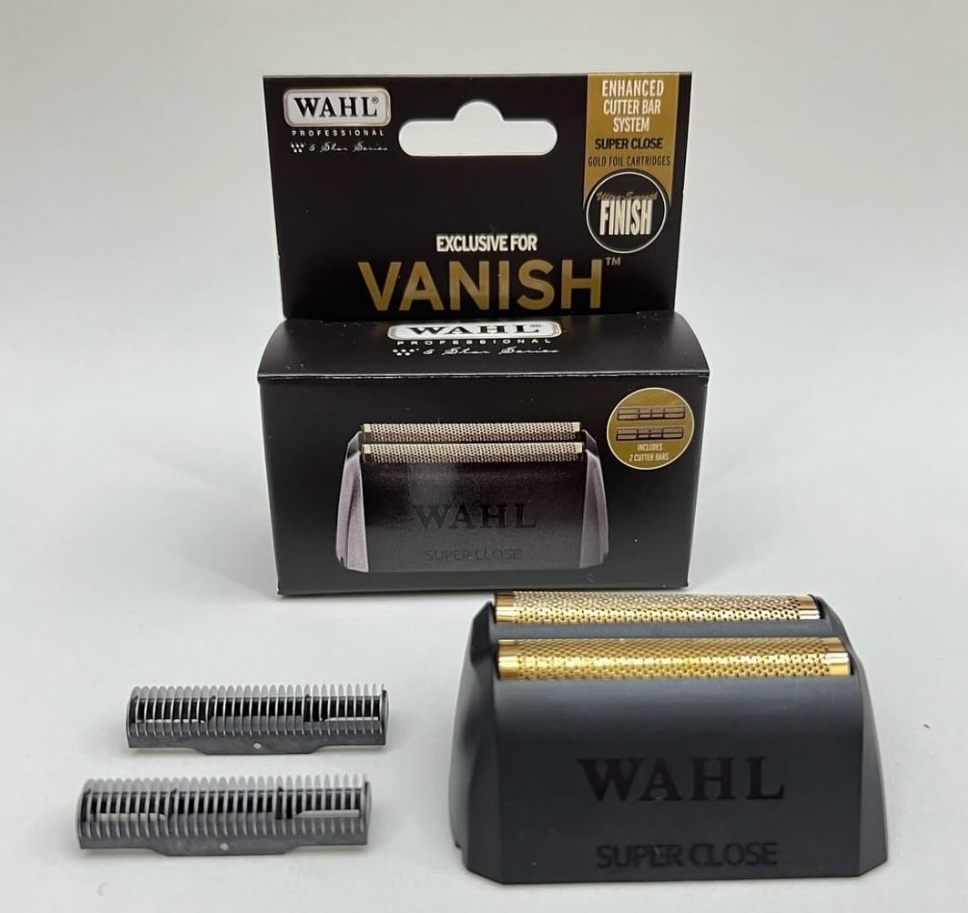 Conjunto de cortador de barba Wahl com lâminas douradas e prateadas e embalagem preta