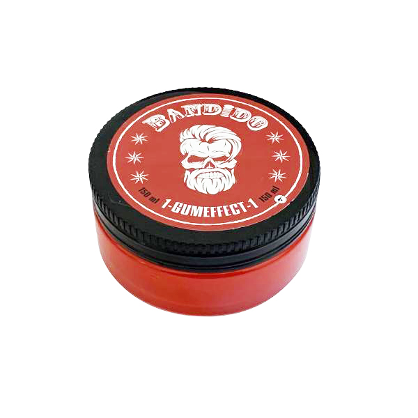 Pote redondo vermelho com tampa preta e desenho de caveira