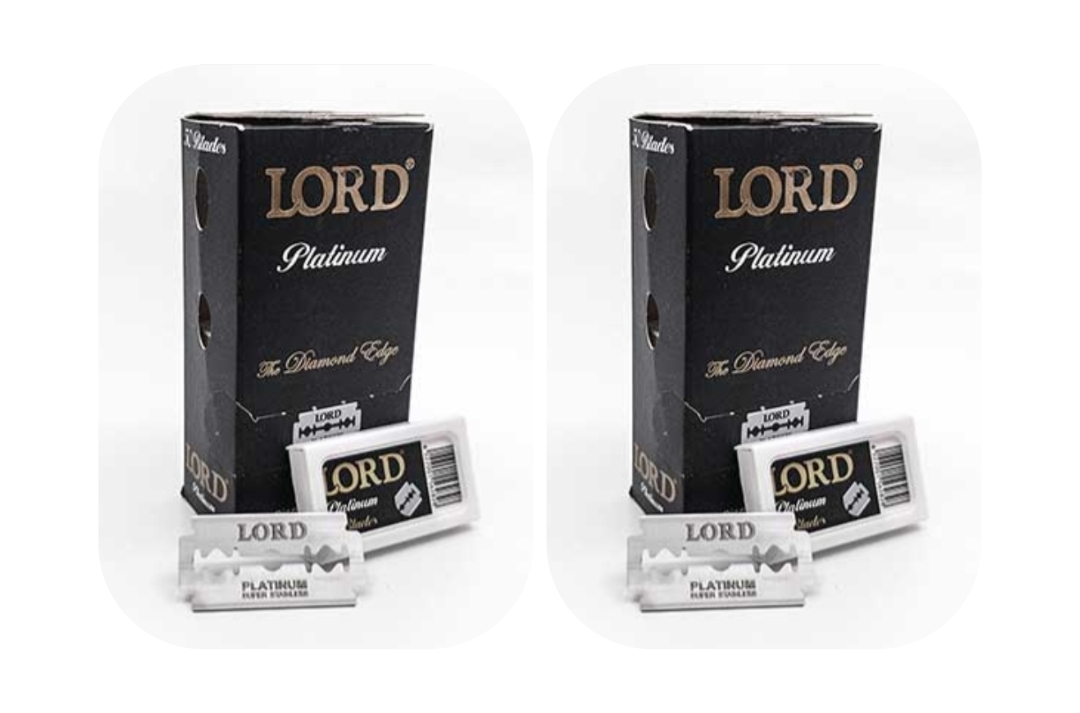 Embalagens pretas e brancas de lâminas de barbear LORD Platinum, com lâminas expostas