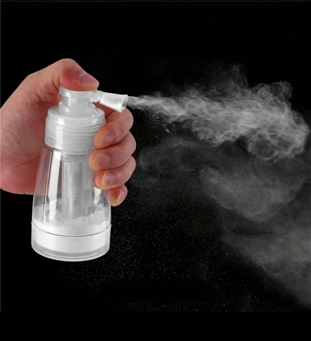 Pulverizador de névoa branco e transparente a ser usado em fundo negro