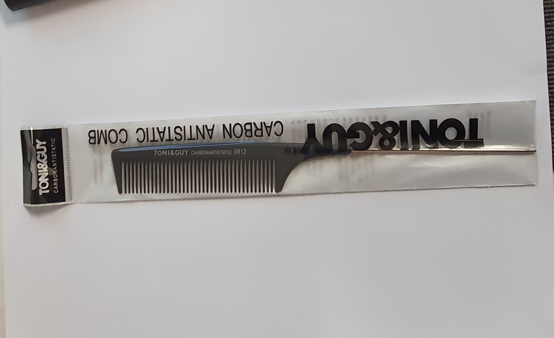 Pente fino metálico TonicCut em embalagem plástica
