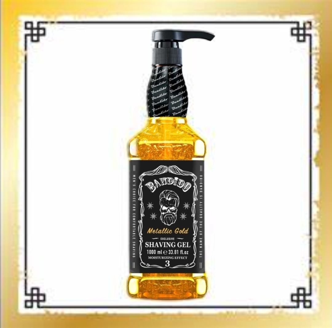 Garrafa de gel de barbear metálico dourado com tampa preta e rótulo preto com texto branco e dourado