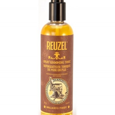 Frasco de spray Reuzel grooming tonic com líquido amarelo e etiqueta castanha