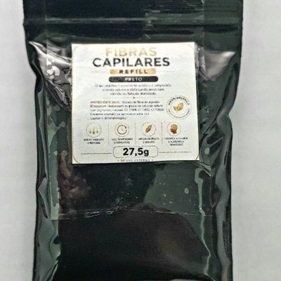 Embalagem preta plástica com rótulo branco de fibras capilares refill preto