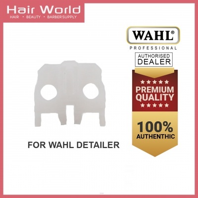 Peça branca de plástico para aparador de cabelo com texto e selo de autenticidade WAHL