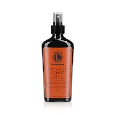 Frasco preto com etiqueta laranja de spray para cabelo Hair Grooming Tonic