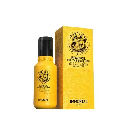 Frasco amarelo de óleo para barba com tampa preta ao lado de caixa amarela com texto preto e logotipo de urso.