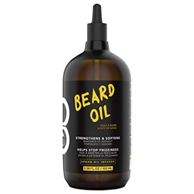 Frasco de óleo para barba castanho com rótulo preto e texto amarelo e branco