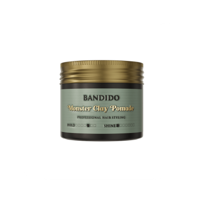 Pomada para cabelo Monster Clay Pomade com tampa dourada e rótulo verde claro