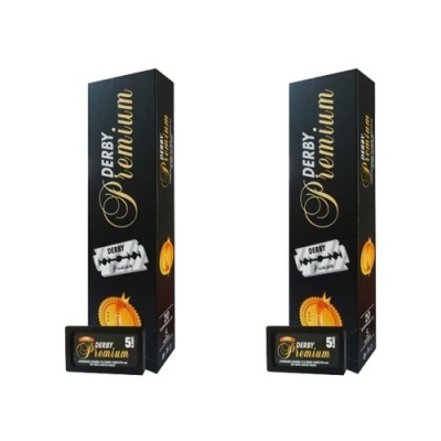 Duas caixas pretas de lâminas de barbear Derby Premium com texto dourado e branco