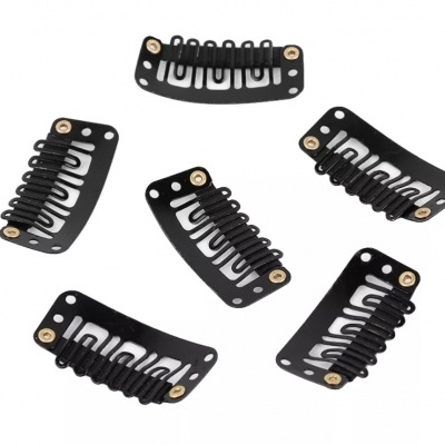 Seis presilhas de cabelo pretas de metal com molas e ilhós dourados