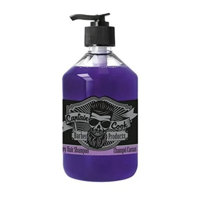 Frasco de champô roxo com etiqueta de caveira e tampa preta