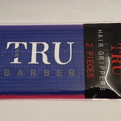 Pacote com 2 peças de Hair Grippers TRU BARBER azul em embalagem preta e vermelha