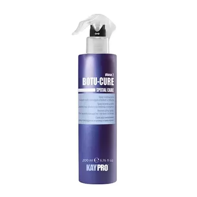 Frasco de spray azul escuro com tampa branca e texto visível