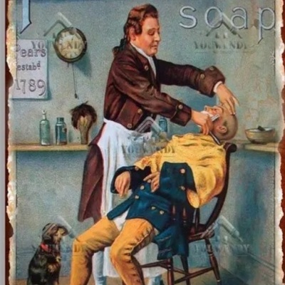 Placa vintage de publicidade de sabão Pears soap em cenário de barbearia antiga